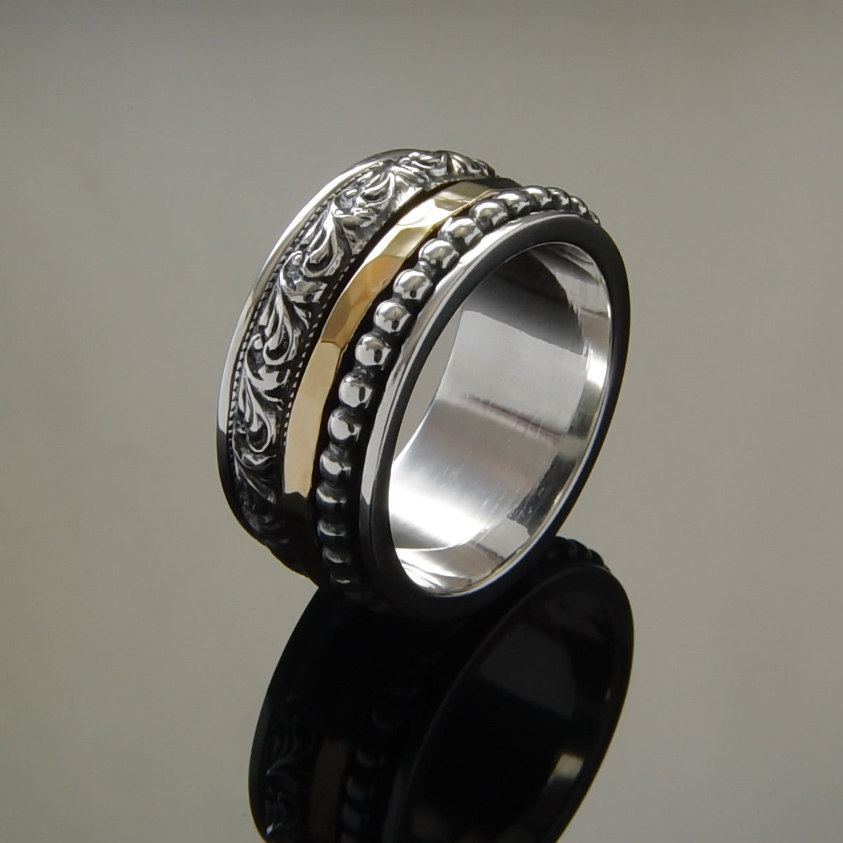 R1149H Hammered gold and silver spinner ring