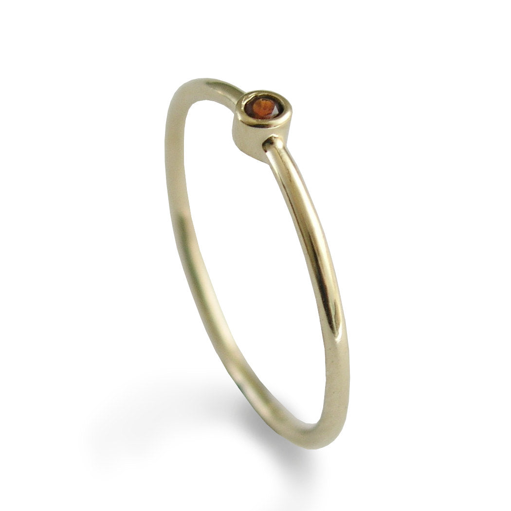 RG1802-5 Tiny gold Garnet ring