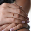 RG1802-5 Tiny gold Garnet ring