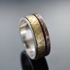 R1149L Textured Copper and Brass spinning men band