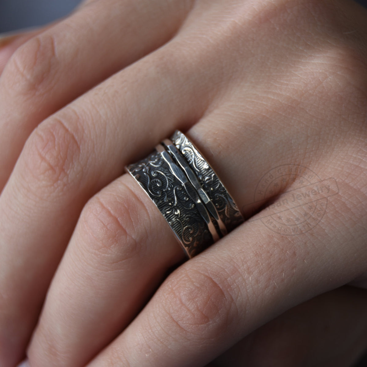 R1209AS Oxidized Silver floral spinner ring