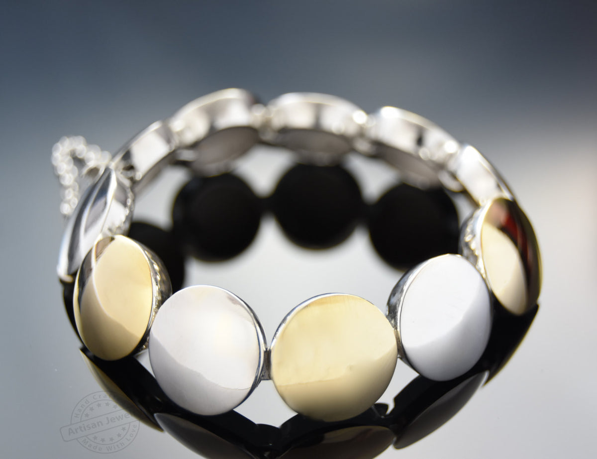 B0672 Round links two tone bracelet