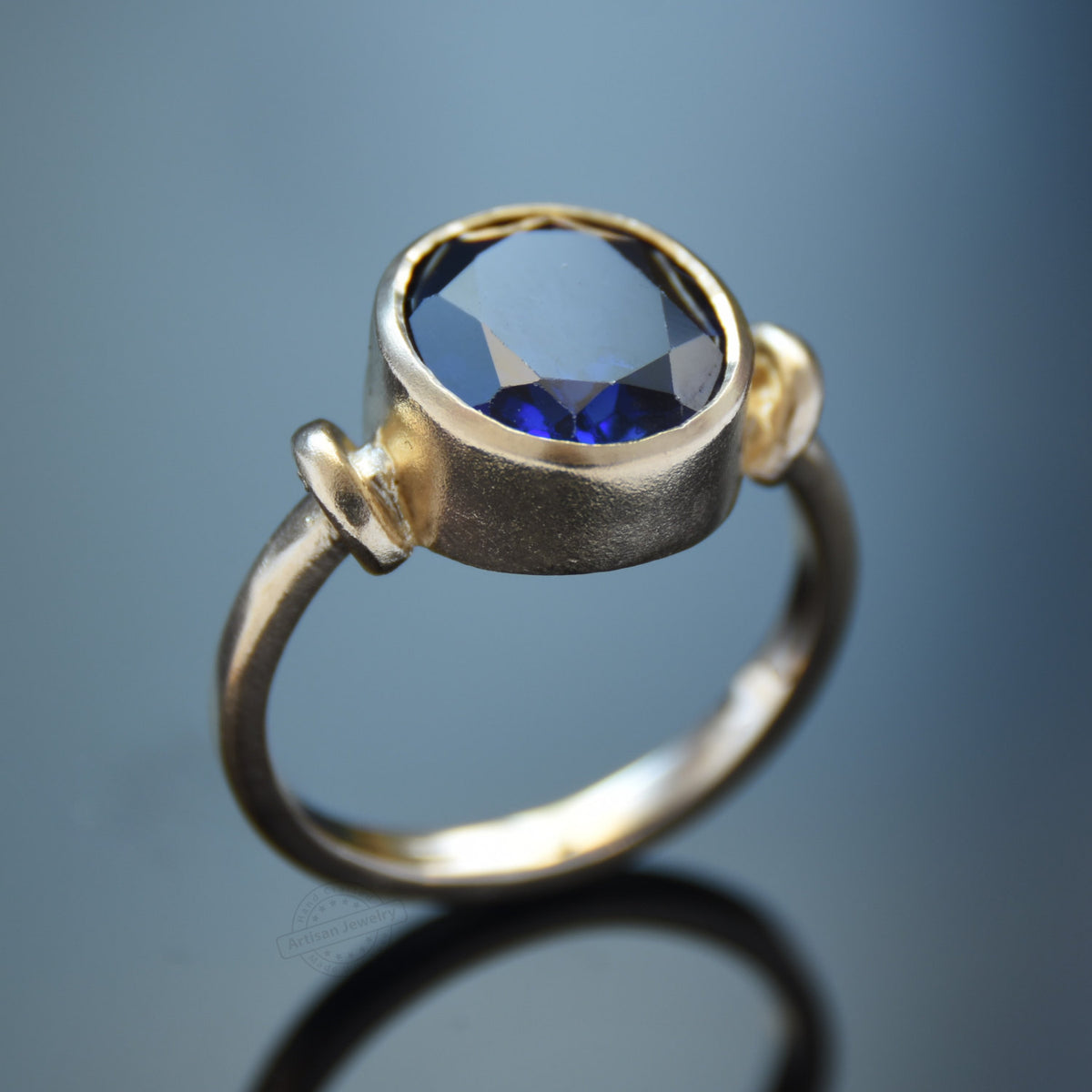 RG1090-2 Matte gold and Sapphire Ring