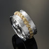 R1196 Mixed pattern Silver and Brass spinner ring