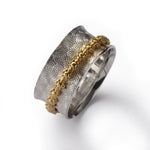 R1196 Mixed pattern Silver and Brass spinner ring