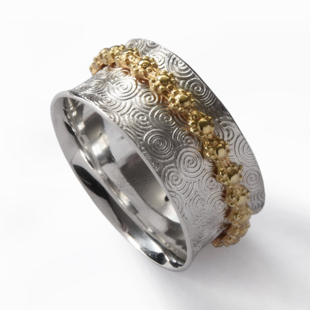 R1196 Mixed pattern Silver and Brass spinner ring