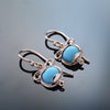 EG7810-3 Turquoise round rose gold earrings