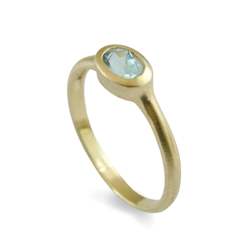 RG1801-1 Modern oval Gold Topaz ring